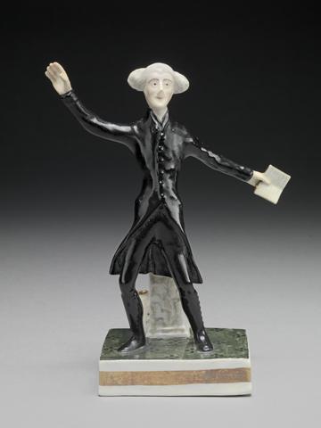 Derby porcelain factory Dr. Syntax: standing, with a book in one hand and arms outstretched