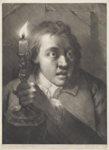 Man Holding a Candle