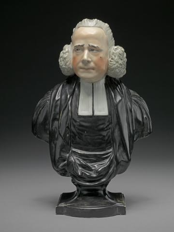 Staffordshire pottery Bust of the Reverend George Whitfield: with ruddy cheeks, prominent mole, black robes and clerical collar