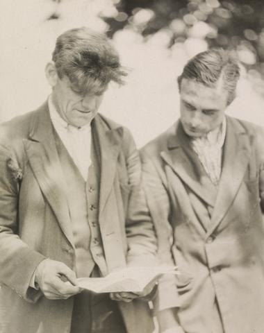Emil Otto Hoppé "Dirty Dick" and Mate Reading a Book, London