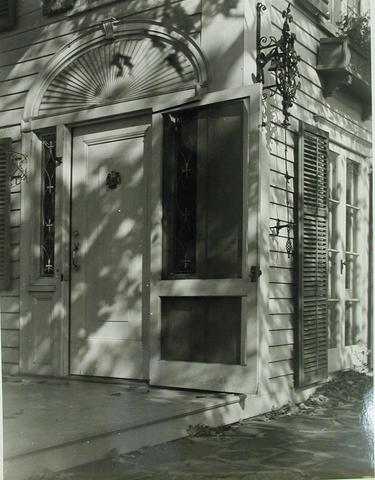 John Schiff, Exterior view of Katherine S. Dreier's West Redding home, "The Haven" -- door with metal bell pull, 1941