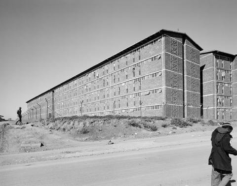 David Goldblatt, South-east wing of a hostel for Black male workers erected during apartheid as part of a scheme to make Joburg city and suburbs white. Alexandra Township, June 1, 1988