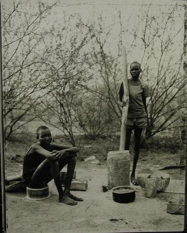 Fazal Sheikh, William Biar Gai and Bol Aguot, preparing millet, Sudanese refugee camp, Kakuma, Kenya, 1992/1993