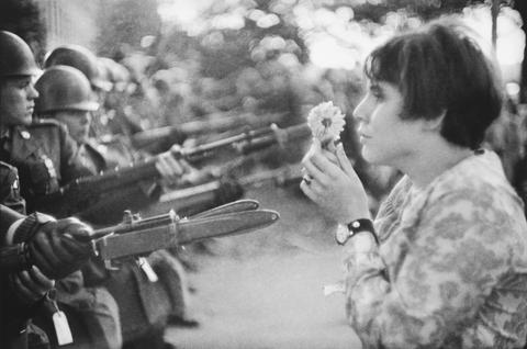 Marc Riboud, Confrontation between a flower and the bayonets of soldiers guarding the Pentagon during the March for Peace in Vietnam, Washington, D.C., 1967, 1967