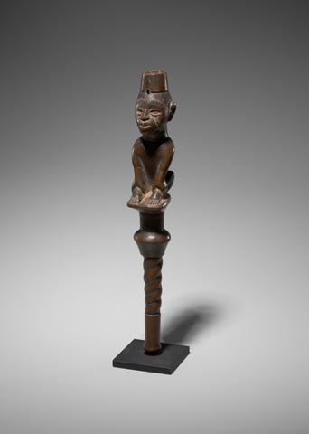 Fly Whisk Handle with a Seated Male Figure, late 19th–early 20th century