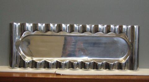 Stanley Tigerman, Pair of bread trays, "Alternative Metal Series", 1995