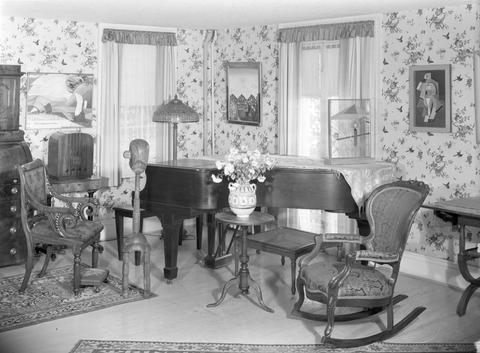 John Schiff, Interior view of Katherine S. Dreier's West Redding home, "The Haven," with piano -- Constantin Brancusi's Little French Girl [Guggenheim] -- Max Ernst's Paris Reve [1952.30.5], 1941