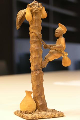 Thorn Carving of Man Palm Tapping, mid-20th century