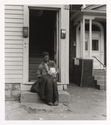 Milton Rogovin, Lower West Side [father in doorway with young daughter - a], from the series Buffalo Lower West Side, 1973, printed later