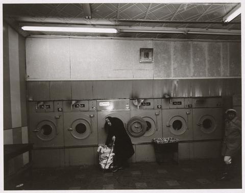 Bruce Davidson, East 100th Street (woman in laundromat), 1968